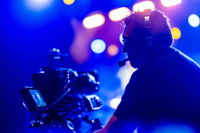 live stream corporate event seattle camera operator blue background