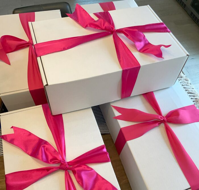 Gift boxes with pink ribbons