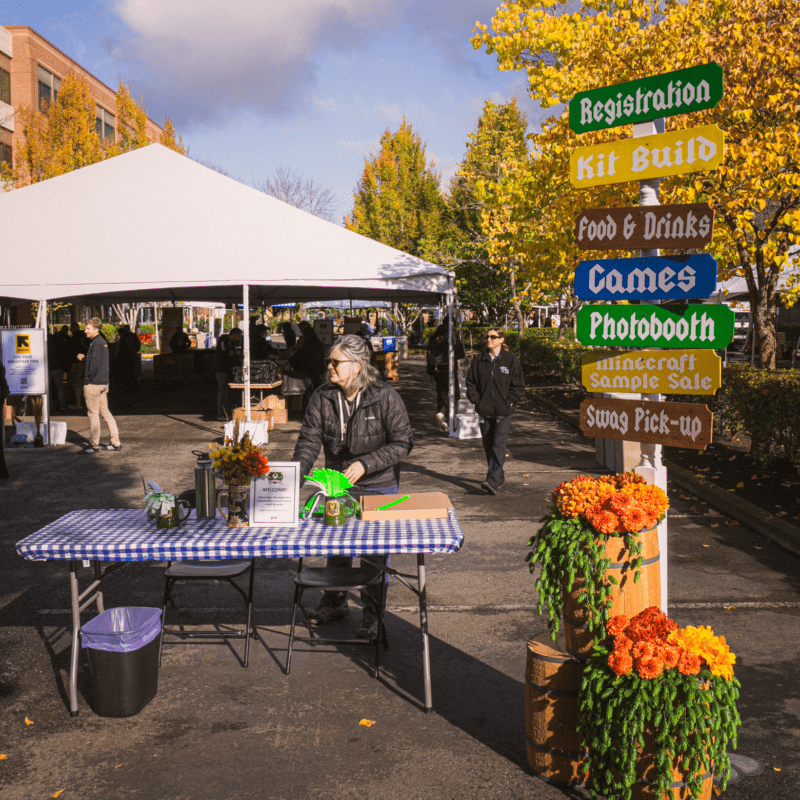 givetoberfest welcome sign registration charitable fundraising event design oktoberfest redmond corporate event planning outdoor
