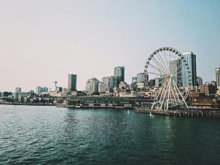 Seattle waterfront skyline with Ferris wheel and iconic Space Needle
