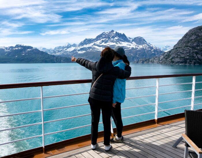Alaska Cruise Glaciers guests pointing to views incentive travel